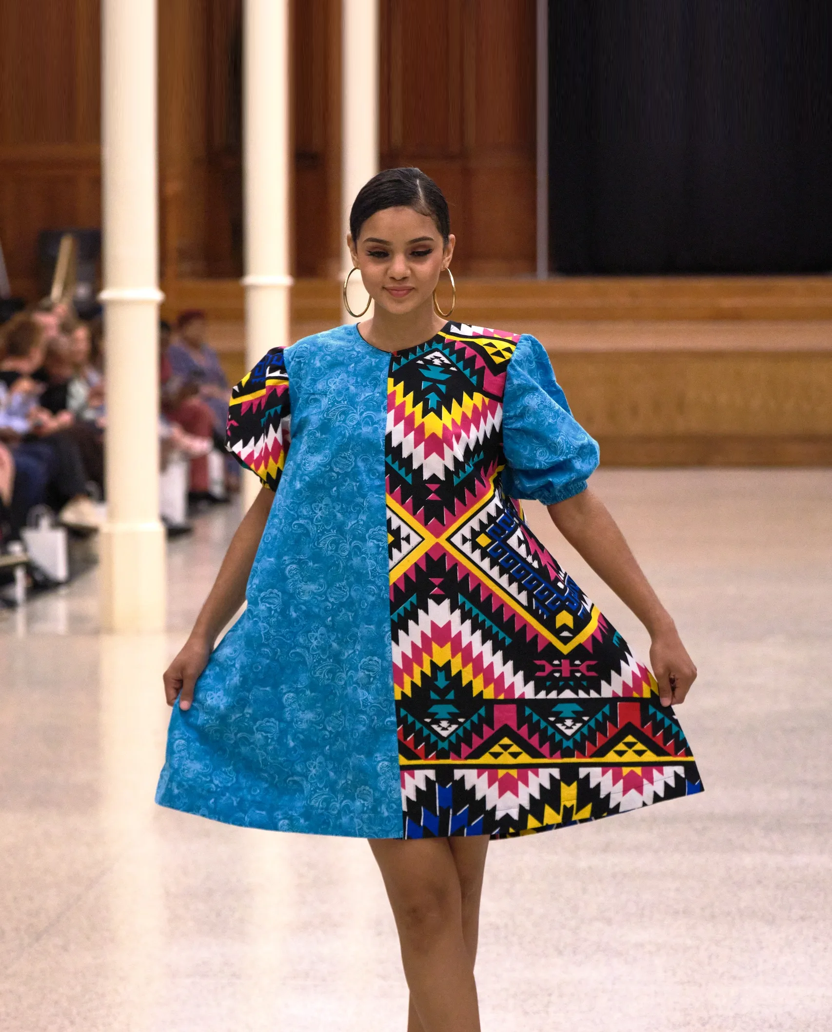 African fashion model in silk formal wear